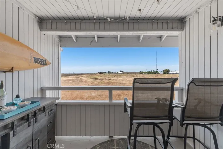 Exceptional Sunset Views facing the Randall Preserve off this fun covered balcony.