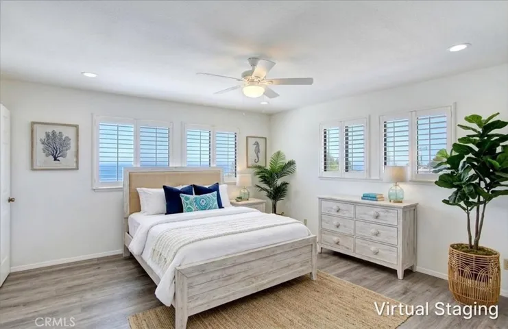 Virtually staged primary bedroom one