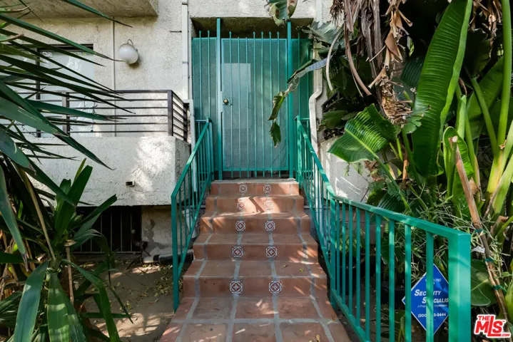 gate to stairs up to unit