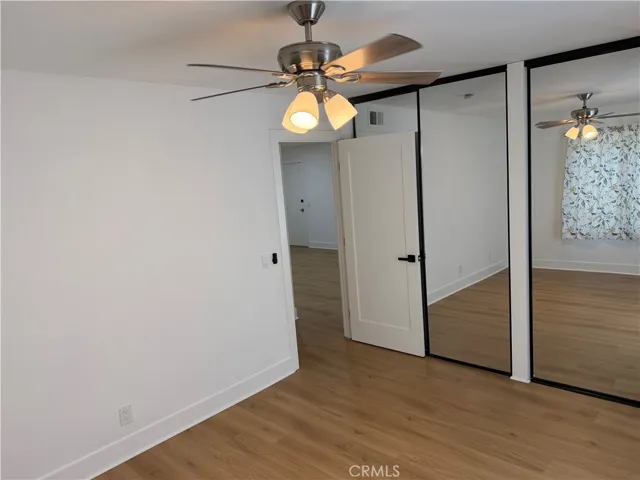 Primary bedroom with 2 closets mirrored doors