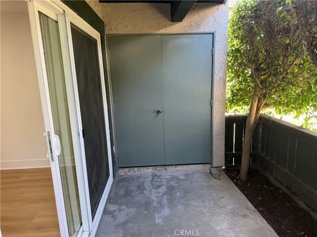 front closet containing washer/dryer