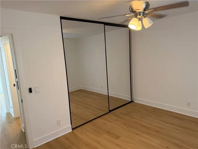 secondary bedroom mirrored closet
