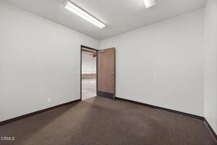 Office door to​​‌​​​​‌​​‌‌​​‌​​​‌‌​​​‌​​‌‌​​‌‌​​‌‌​​​​ warehouse