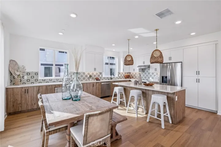 Model home dining and kitchen used for representational purposes only.