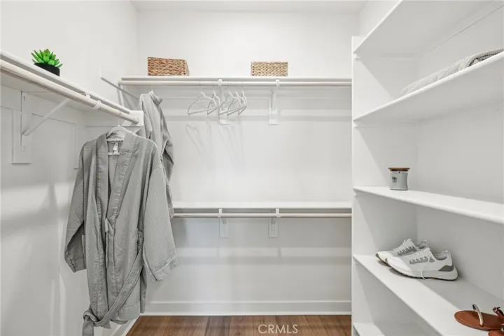 Model home primary walk-in closet