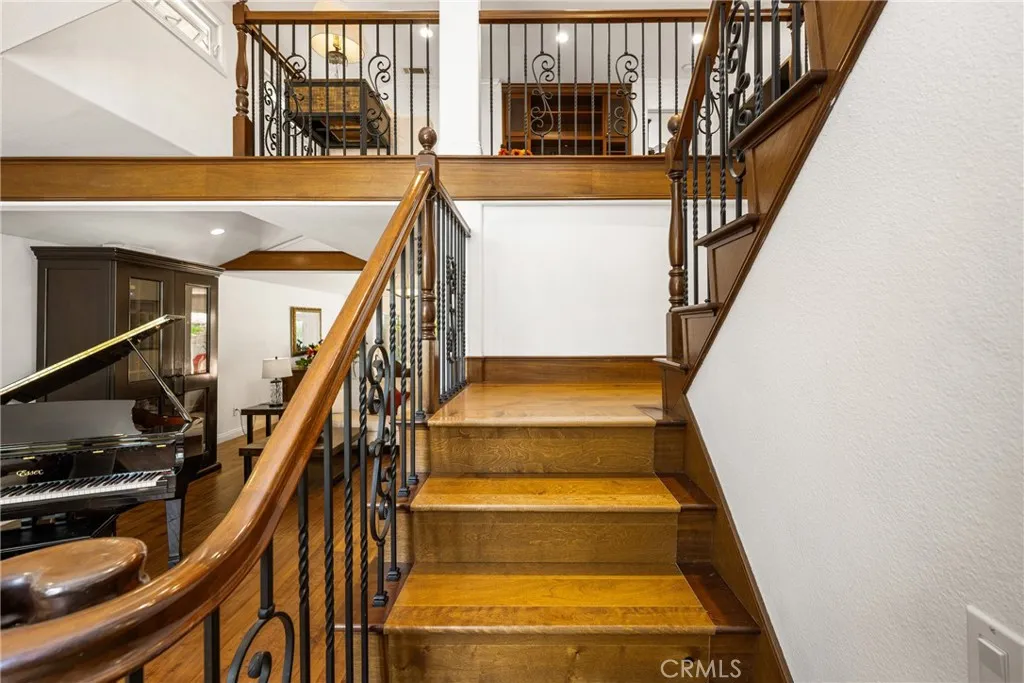 Stairway going upstairs to the bonus area, 4 bedrooms and 2 bathrooms