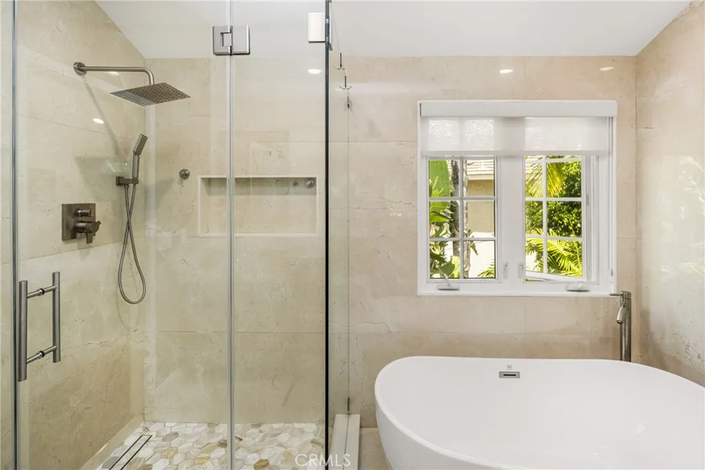 Master bedroom, high ceilings, ceiling fan, recessed lights. with private bath room-separate tub and stall shower.
