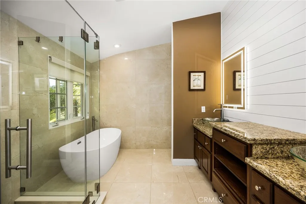 Master bathroom, high ceilings, ceiling fan, recessed lights. with private bath room-separate tub and stall shower.