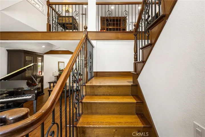 Stairway going upstairs to the bonus area, 4 bedrooms and 2 bathrooms