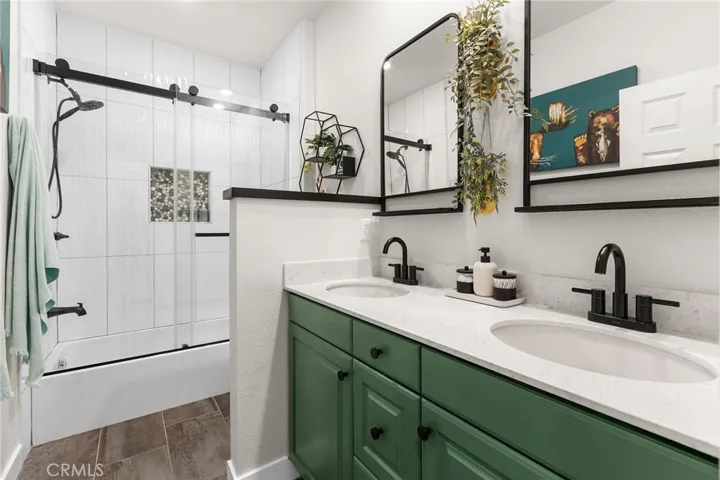 beautiful hall bathroom with tiled shower