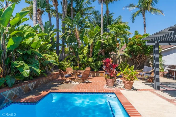 Private tropical backyard retreat with pool & spa