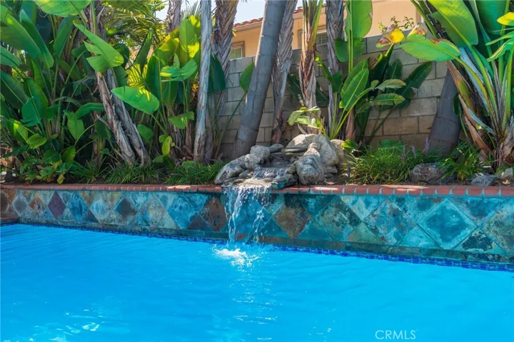Tropical landscaping creates a private resort feel
