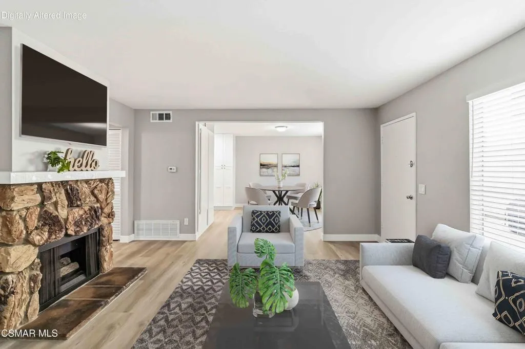 Living Room looking into dining with fir