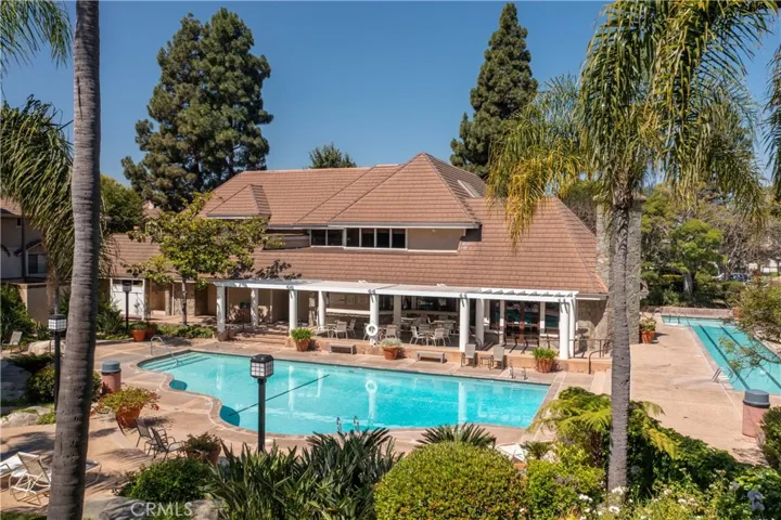 Community Pool with lovely lounge chairs and a lap pool plus a jacuzzi!