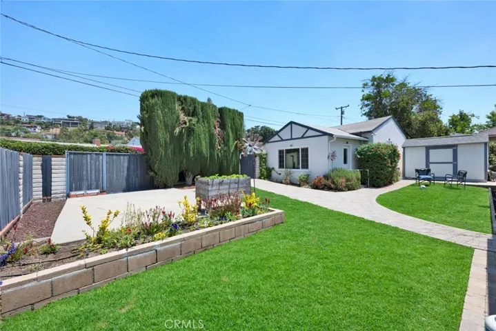 Concrete pad with sliding door in rear yard