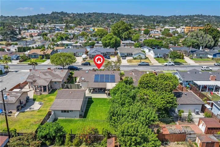 Aerial views place 140 E Greenwood within Northwest Orange County, with the hills of Fullerton nearby and the Brea hills just beyond — a setting that feels established, scenic, and connected.