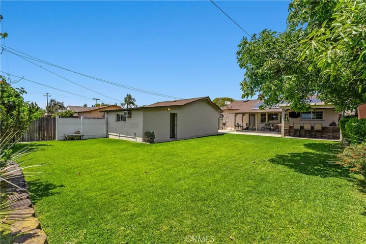 Tucked behind the fully functional two-car garage, the attached Junior ADU adds valuable flexibility for guests, work, recreation, or extended living.