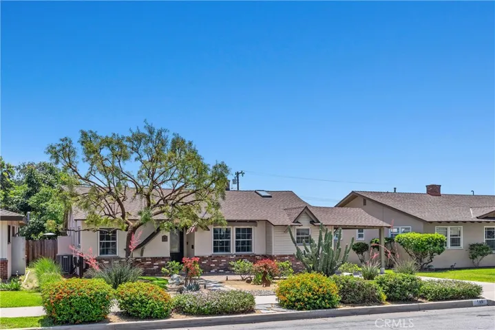 Major improvements include all new double-hung windows and doors, updated baseboards, new interior paint, attic and exterior wall insulation, newer furnace and AC, and fully paid seller-owned solar.