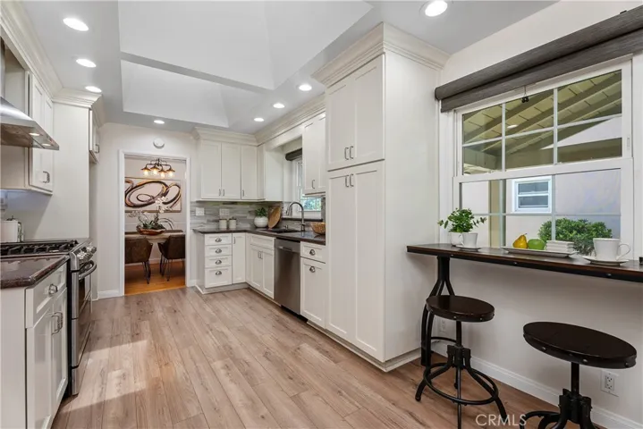 A built-in desk and hutch add charm and everyday function, creating a thoughtful space for organization, display, or planning.
