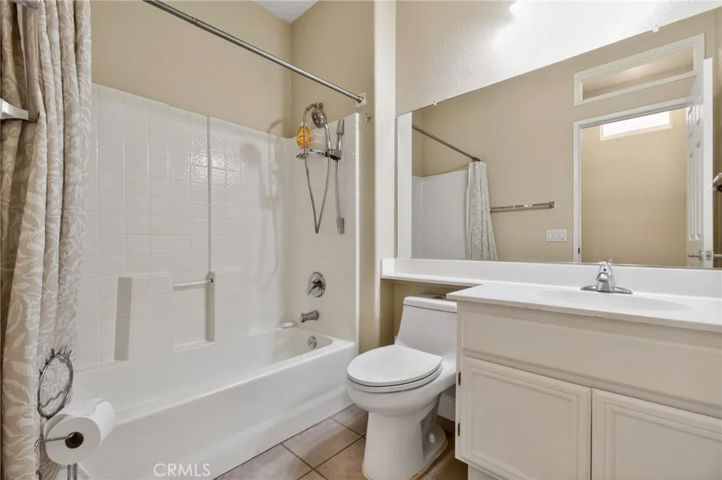 Guest Bathroom towards front of the home away from kitchen