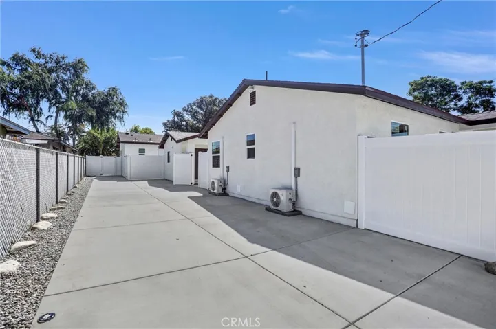 Tandem shared parking area behind gate