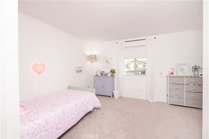 Upstairs bedroom with walk in closet