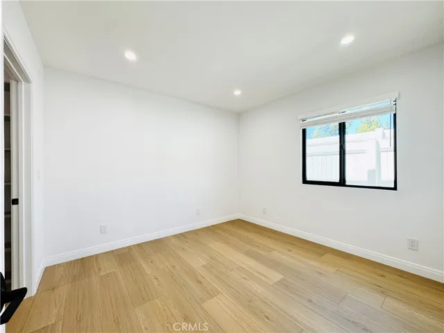 Bedroom with recessed lighting