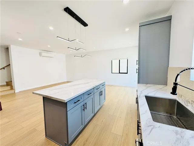 Modern lighting and convenient island