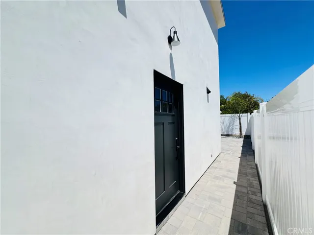 Exterior front door walkway to patio