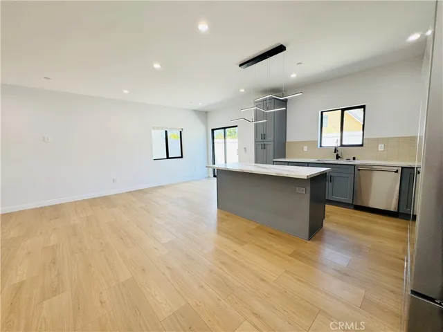 View from front door into kitchen and large living room