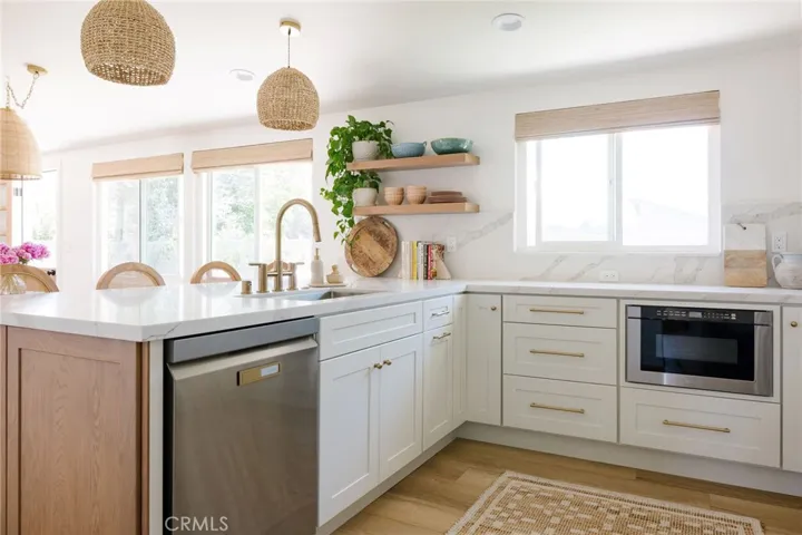 New Dishwasher & Microwave Included.