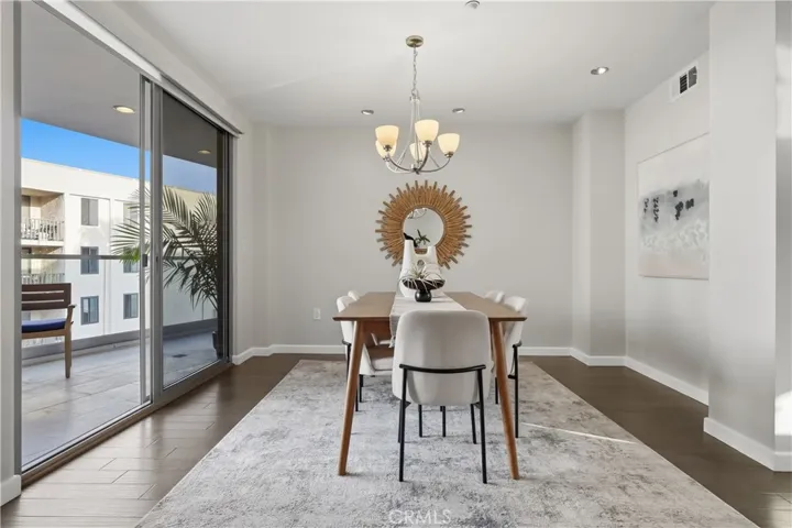 Large Dining area with sliding doors to balcony
