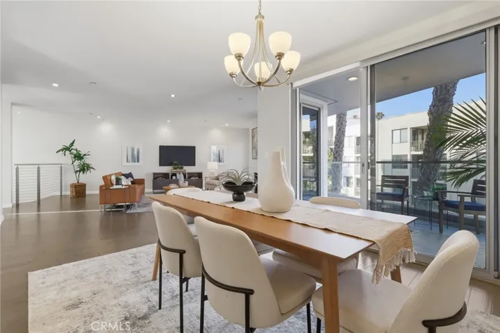 Large Dining area with sliding doors to balcony