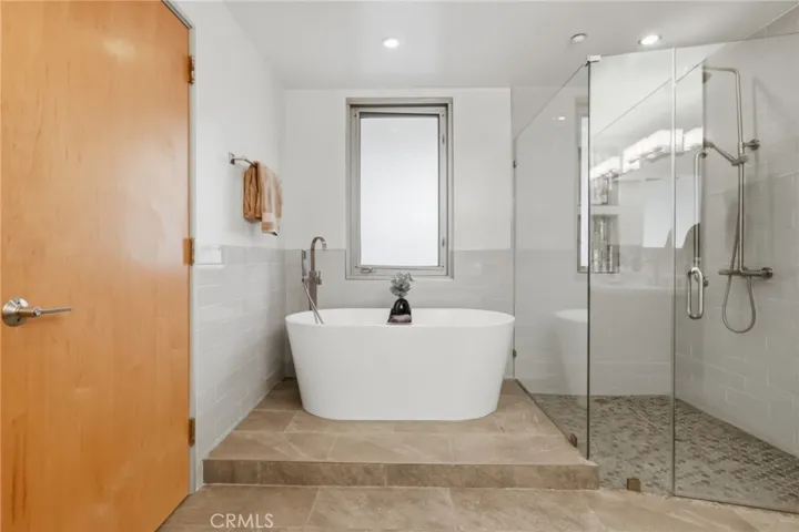 Primary bathroom large soaking tub and walkin shower