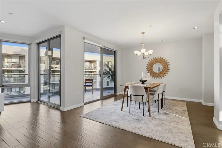 Large Dining area with sliding doors to balcony