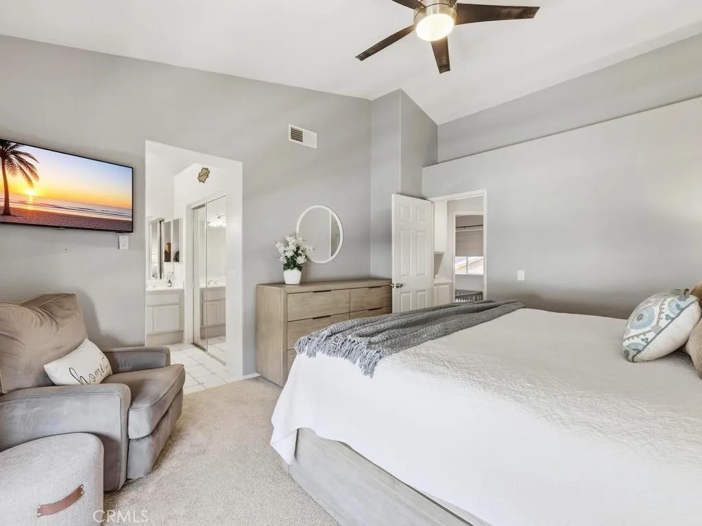 Primary suite with walk-in closet and bathroom