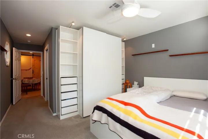 primary bedroom with built in storage