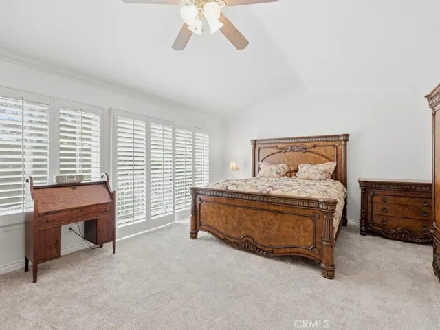 Primary Bedroom w/balcony and walk in closet