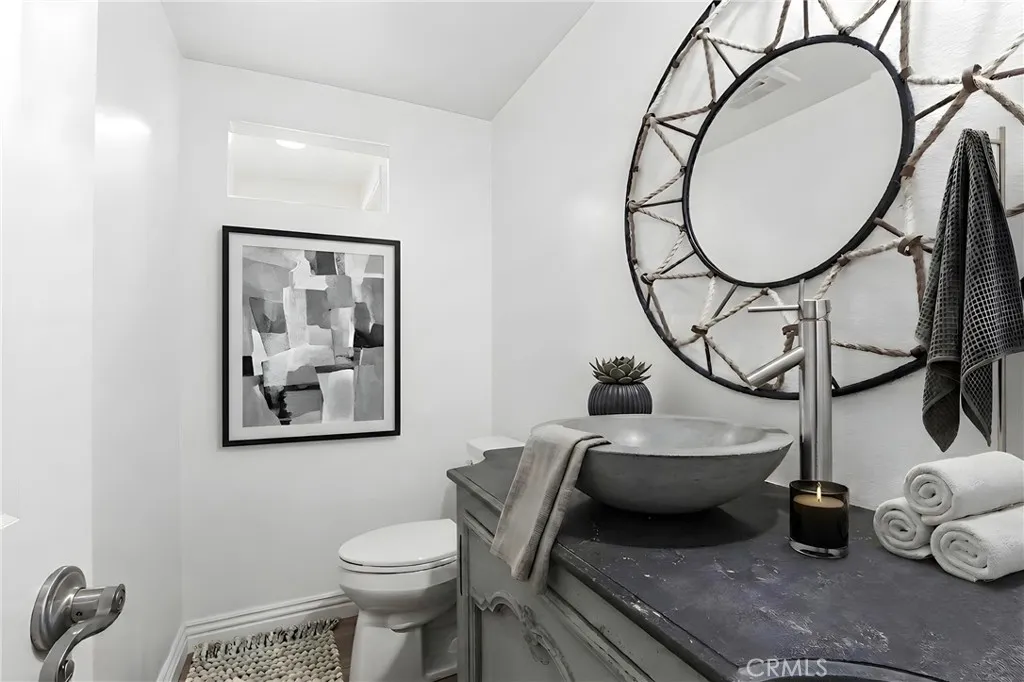Downstairs guest powder room.