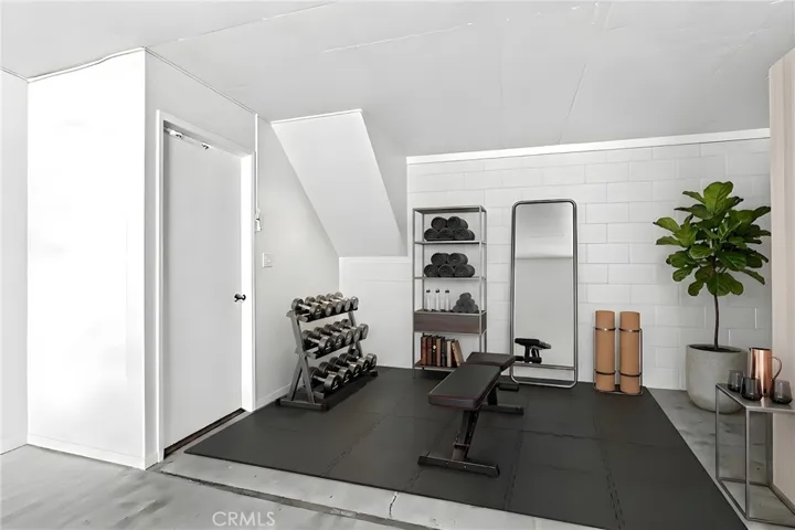 Flex space in the oversized garage. Perfect for yoga, podcast studio, play area for the kids, storage, office, gym...you get the point. VIrtually staged.