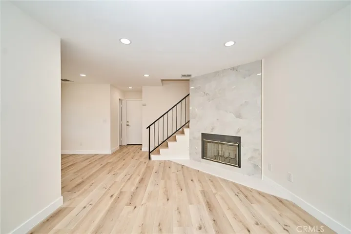 LIVING ROOM WITH ELEGANT MODERN FIREPLACE