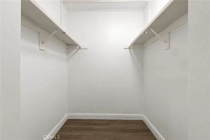 Guest bedroom walk-in closet.