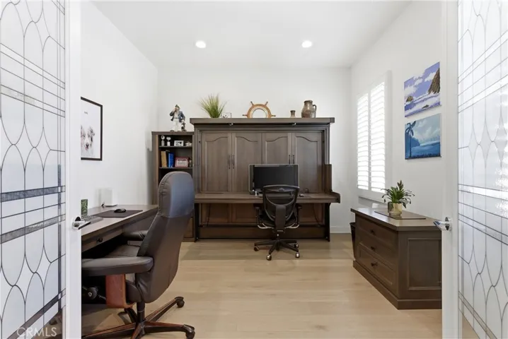Double doors lead to the den which can serve as a home office, guest room, or both!
