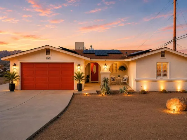 Front of house at sunset