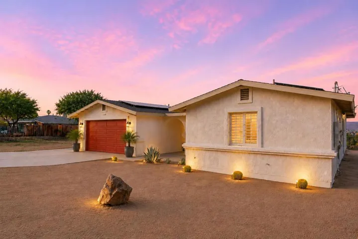 Front of house at sunset left angle