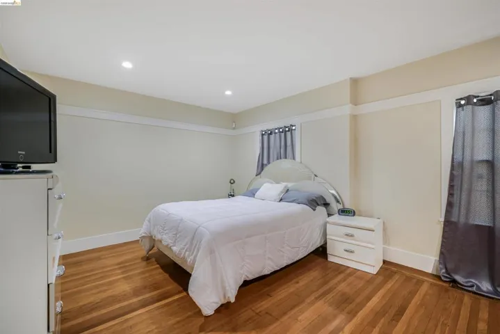 Bedroom featuring light wood finished floors and recessed lighting