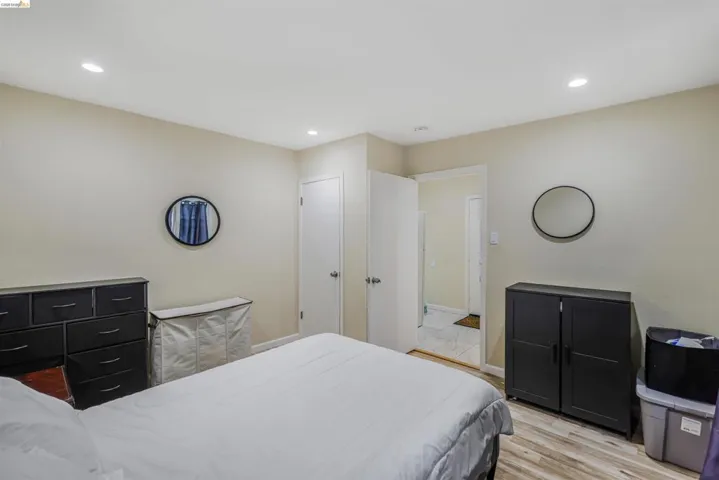 Bedroom featuring light wood finished floors and recessed lighting