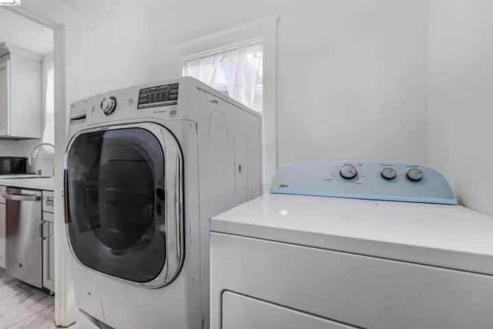 Laundry room with washer and dryer