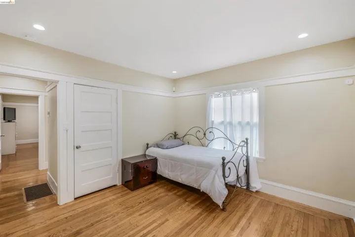 Bedroom featuring recessed lighting and light wood-type flooring