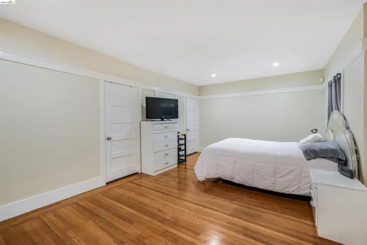 Bedroom featuring light wood-style flooring and recessed lighting